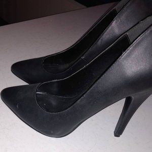 Black heels with a pointy toe. Heel is 6 inches